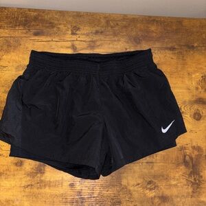 Women’s Nike running shorts with built in shorts/liner.